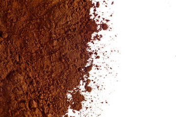 Heap of cacao powder isolated on a white background. Top view.
