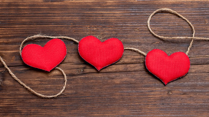 Obraz na płótnie Canvas Handmade red heart near rope. Valentine's Day card