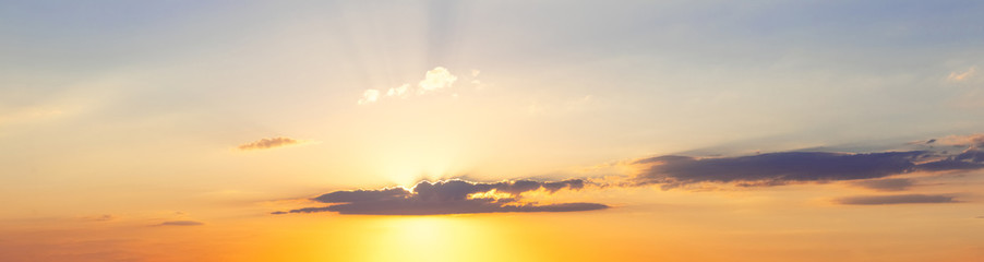 Fototapeta premium Panorama of picturesque sky with a strip of clouds during sunset