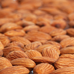 Background from the nuts of almonds, selective focus.