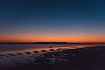 Scenic view of turkish salt lake with amazing sunset