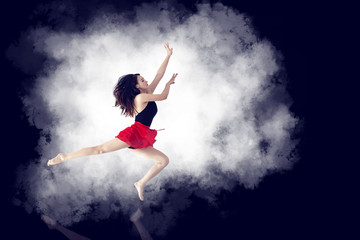 Fototapeta na wymiar A long-legged girl jumping in front of a minimalist, graceful background