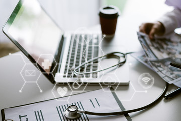 doctor working on laptop