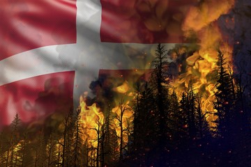 Forest fire fight concept, natural disaster - infernal fire in the woods on Denmark flag background - 3D illustration of nature