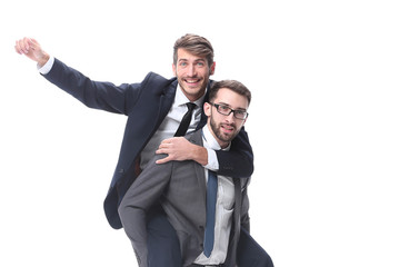 happy businessman carrying his colleague on the piggyback