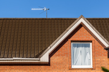 The upper part of the house. Roof, inspection windows, chimney.