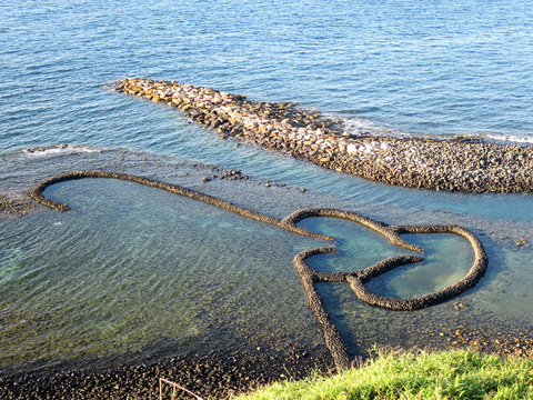 The Twin Hearts Stone Weir (七美雙心石滬) in Qimei (sometimes spelled Cimei) Island, Penghu County, TAIWAN