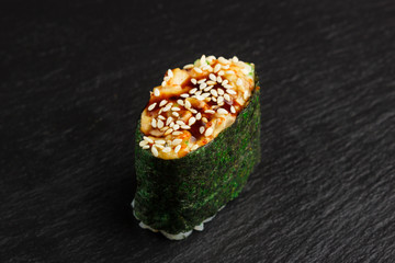 Japanese food: Set of salmon sushi and rolls with salmon and eel