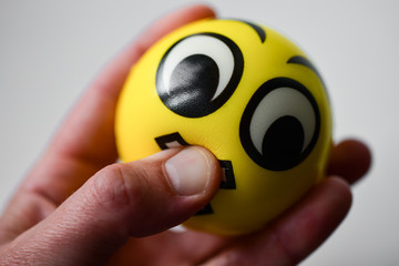 Hand smile crushes the freedom of speech, the dictatorship