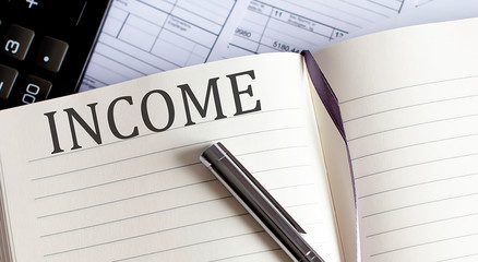 Notebook with Toolls and Notes about INCOME