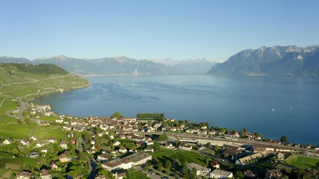 Beautiful Landscape Of Cully Village On The Shores of Lake Leman, Switzerland - Aerial shot (panning)