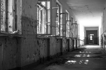 Dark corridor, mysterious and dangerous place in black and white