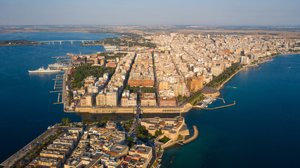 Beautiful panoramic aerial view photo from flying drone on Old medieval Aragonese Castle on sea...
