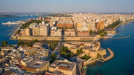 Beautiful panoramic aerial view photo from flying drone on Old medieval Aragonese Castle on sea...
