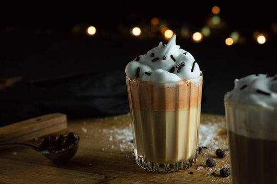 Dalgona coffee with dark and bokeh background with dark background