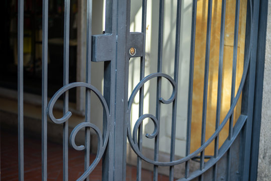 detail of a wrought iron gate for shop