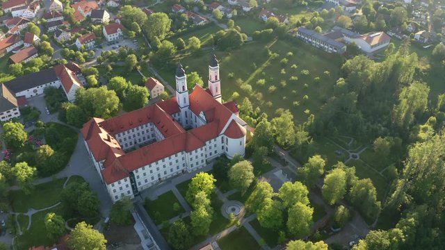 Aerial view flight at Benedictine monastery in Irsee, Diocese of Augsburg, Bavaria, Germany,