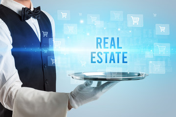 Waiter serving REAL ESTATE inscription, online shopping concept