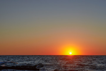 Beautiful sunset over the ocean. Sunrise in the sea