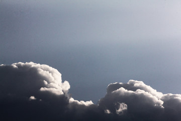 white fluffy clouds in the blue sky