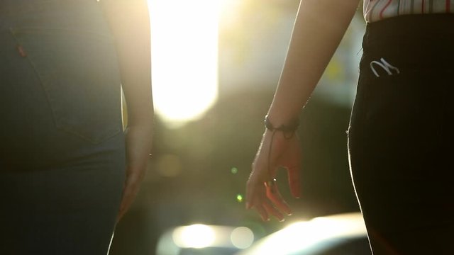 Disjoining hands close-up. Two people separation concept