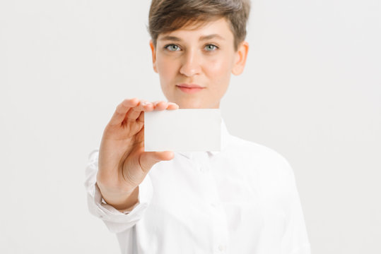  close-up portrait of a young businesswoman with Blank Business Card