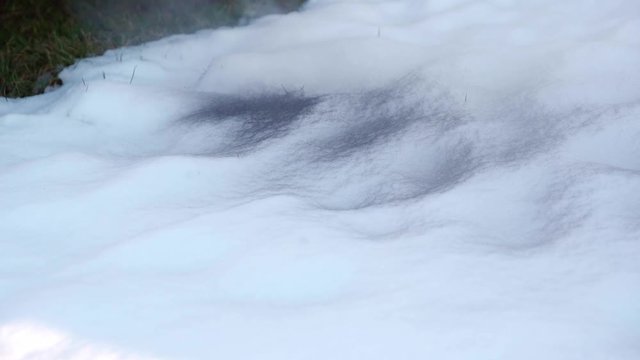 Diesel car start engine with big amount of smoke. Leaving black sign on the snow. Ecology problem with cars