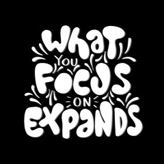 Hand Lettered What You Focus On Expand. Handwritten Inspirational Motivational Quotes. Hand Lettering Quote. Religious Quote. Design For Greeting Cards, Apparel, Prints, and Invitation Card.