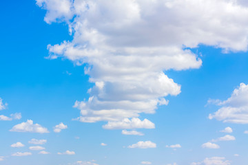 Fototapeta premium Blue sky with white clouds. The clouds in the sky.