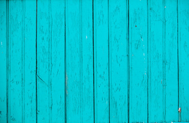 Vintage blue wood background texture with knots and nail holes. Old painted wood wall. Blue abstract background. Vintage wooden dark horizontal boards. Front view with copy space