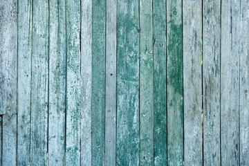 Vintage blue wood background texture with knots and nail holes. Old painted wood wall. Blue abstract background. Vintage wooden dark horizontal boards. Front view with copy space