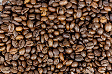 Detail of brown coffee beans seen from above
