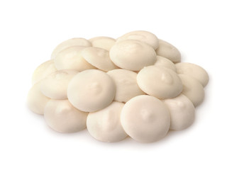 Pile of white chocolate buttons