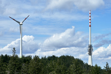Wind turbine and communications tower on Hornisgrinde mountain in the Black Forest, Germany