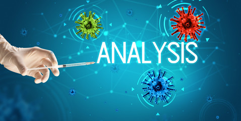 Syringe, medical injection in hand with ANALYSIS inscription, coronavirus vaccine concept