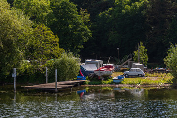 Fototapeta na wymiar Fotos einer Bootsfahrt auf dem Großen Plöner See ein unter Naturschutz stehender See in Schleswig-Holstein