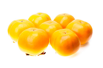Seven ripe persimmons
