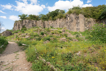 Fototapeta na wymiar Path to a rock wall of the Stenzelberg.