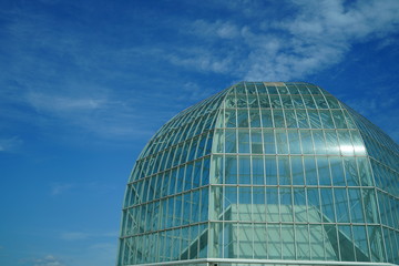 Fototapeta na wymiar Kasai rinkai koen , big window white architecture is under the blue sky in Tokyo, Japan.