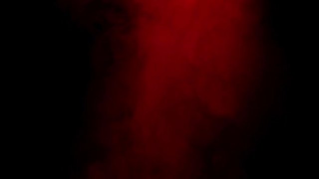 Soft Red Fog in Slow Motion on Dark Backdrop. Realistic Atmospheric Red Smoke on Black Background.. Abstract Haze Cloud. Smoke Stream Effect