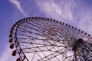 Ferris wheel after sunset at Kasai Rinkai koen, Tokyo, Japan. Purple and blue sky is beautiful.