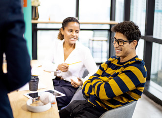 Happiness young business teamwork partnership talking and discuss in the office.