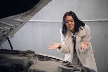 The client is angry because her car was not repaired