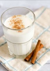 Kefir with cinnamon in a glass for boost the immune system. Immunological and stomach benefits, prevents illness and weight loss.