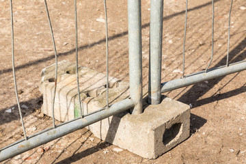 Closeup shot of a bend steel fence