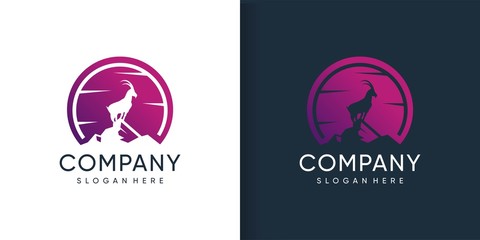 Goat logo standing in the mountain with silhoutte concept Premium Vector