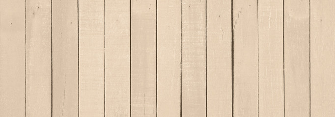 Naklejka premium Light yellow wood grain background derived from natural tree