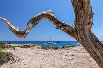 Seascape with azure sea and yachts off the coast of Ibiza island. Balearic Islands. Spain