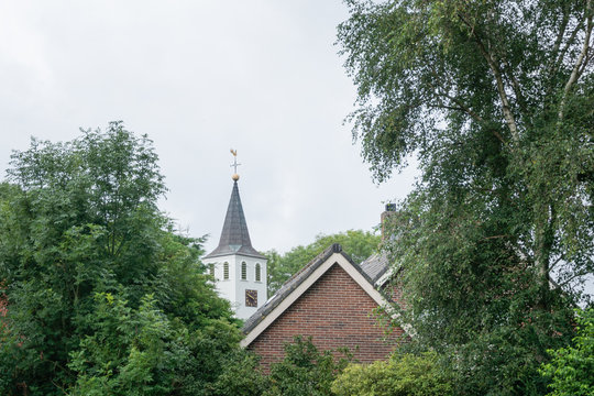 Framed view on the church tower of Kwadijk.