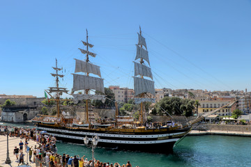 The Amerigo Vespucci training ship of the Italian Navy crosses the navigable canal of Taranto,...